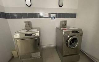 Lave linge seche linge payant dans la residence